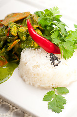 Image showing chicken with green curry vegetables and rice