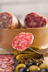 Image showing cold cut platter with pita bread and pickles