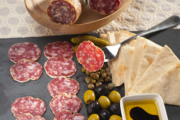 Image showing cold cut platter with pita bread and pickles