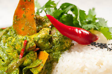 Image showing chicken with green curry vegetables and rice