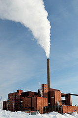 Image showing power station in winter, steam from stack