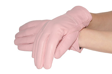 Image showing Closeup leather pink gloves on graceful hands