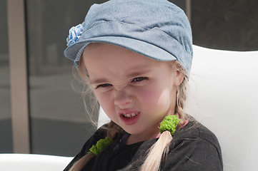 Image showing Grimacing little girl