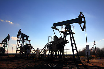 Image showing working oil pumps silhouette