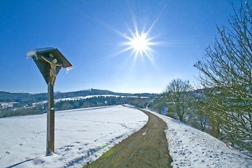 Image showing Jesus on cross in wintertime