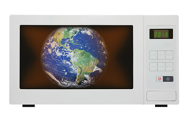 Image showing global warming - earth in microwave