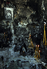 Image showing icon and candles in grotto