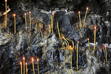 Image showing candles in grotto