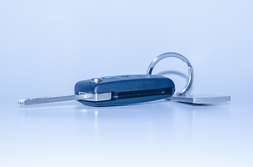 Image showing Folding car key with remote control blue toned