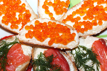 Image showing Sandwiches with red caviar and red fish