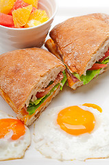 Image showing ciabatta panini sandwich eggs tomato lettuce