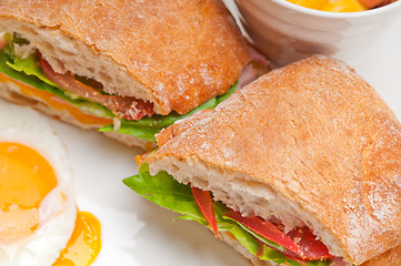 Image showing ciabatta panini sandwich eggs tomato lettuce