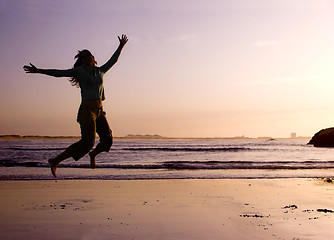 Image showing Jumping on the beach