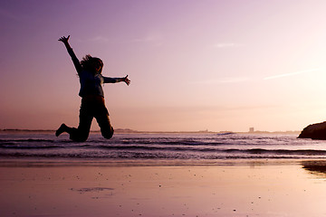 Image showing Jumping on the beach