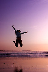 Image showing Jumping on the beach