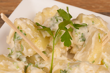 Image showing Potatoes in garlic sauce