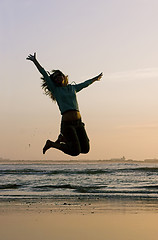 Image showing Jumping on the beach