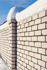 Image showing White Brick wall, covered with snow 