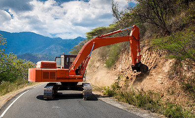 Image showing Excavator repair the road.