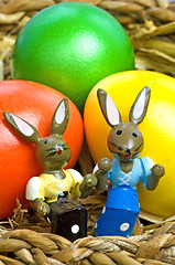 Image showing easter basket with painted eggs and bunnies