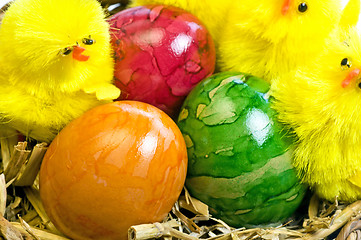 Image showing easter basket with painted eggs and biddies