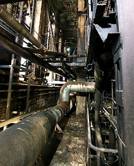 Image showing Old creepy, dark, decaying, destructive, dirty factory