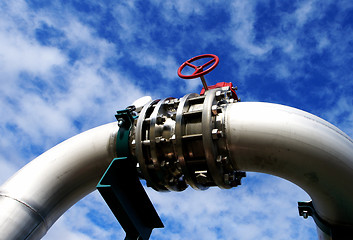 Image showing Industrial zone, Steel pipelines and valves against blue sky