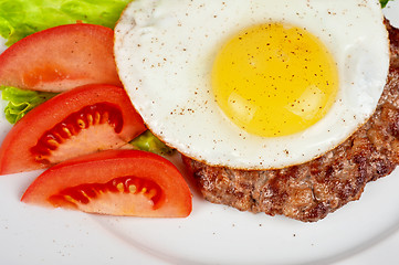 Image showing steak beef meat with fried egg