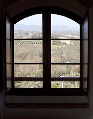 Image showing Beautiful View of Tuscan Farmland from Open Window