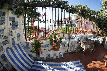 Image showing Well designed terrace with flowers