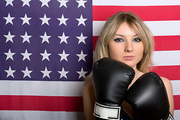 Image showing Beautiful young blonde with boxing gloves