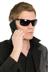 Image showing Young businessman with a phone