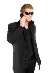 Image showing Man in sunglasses with a mobile