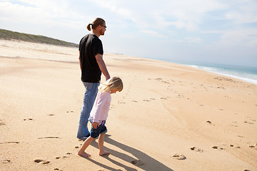 Image showing Father and daughter at the beach