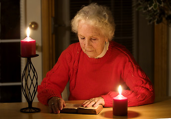 Image showing Elderly woman reading