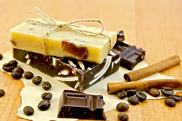 Image showing Soap homemade with chocolate on paper and board