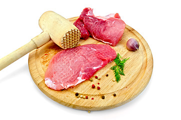 Image showing Meat repulsed with wooden mallet