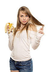 Image showing Woman playing with hair