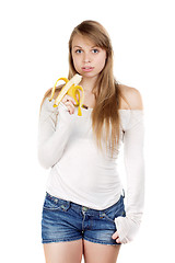 Image showing Woman holding banana  