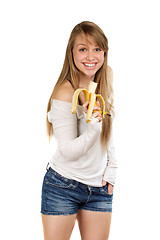 Image showing Joyful woman holding banana