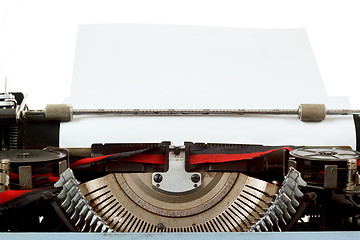 Image showing retro typewriter close up with entered paper