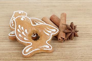 Image showing Gingerbread cookies birds with star anise and cinnamon