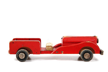 Image showing old red car toy 