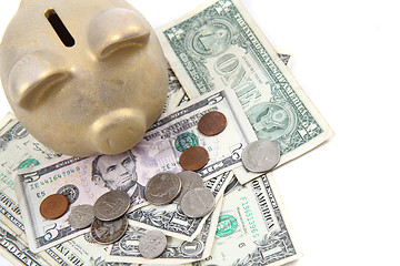 Image showing gold pig bank and dollars 