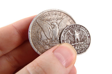Image showing dollar coins in human hand