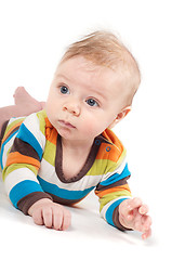 Image showing Little baby in multicolored striped clothes