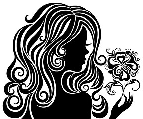 Image showing Silhouette of a girl with a flower