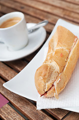 Image showing Bocadillo (seranito) and coffe