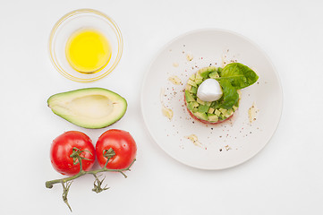 Image showing Tomatoes, avocado and olive oil