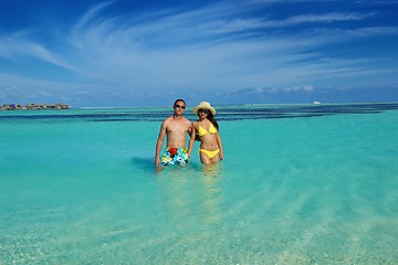 Image showing happy young  couple enjoying summer on beach